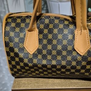 Classic Black and Tan Patterned Barrel Handbag
